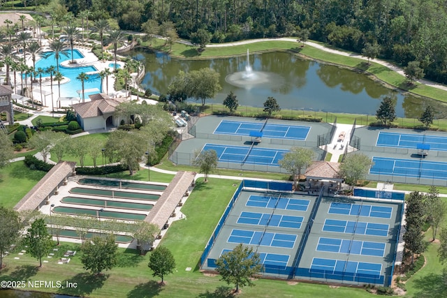 birds eye view of property featuring a water view