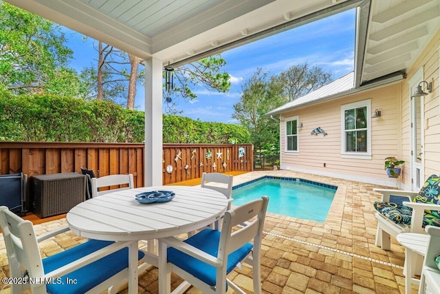 view of pool featuring a patio area