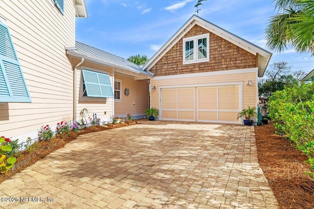 view of front of home featuring a garage