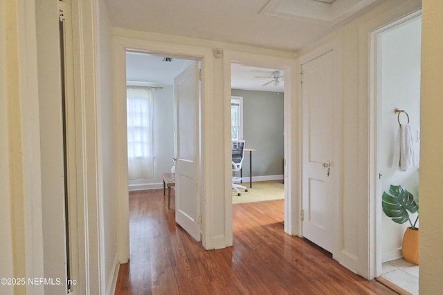 hall featuring hardwood / wood-style flooring