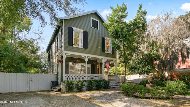 view of front of home featuring covered porch