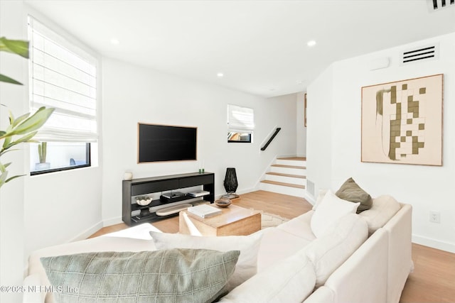 living room featuring light wood-type flooring