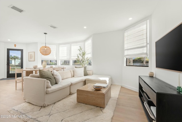 living room featuring light wood-type flooring