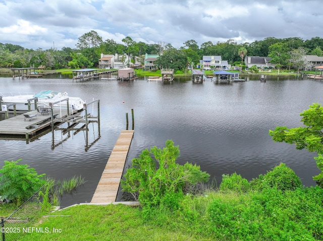 dock area featuring a water view