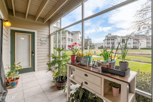 sunroom / solarium with a healthy amount of sunlight