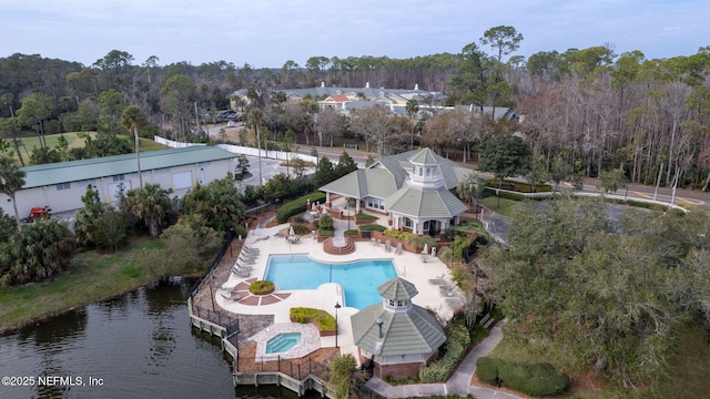 birds eye view of property featuring a water view