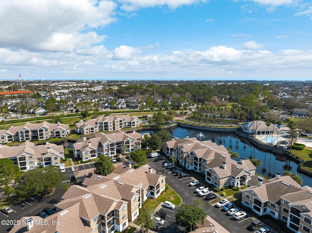 aerial view with a residential view and a water view