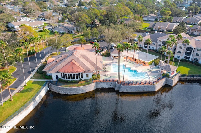 bird's eye view with a water view and a residential view