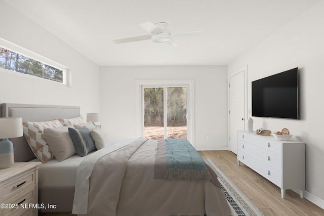 bedroom featuring access to exterior, light wood-type flooring, baseboards, and a ceiling fan