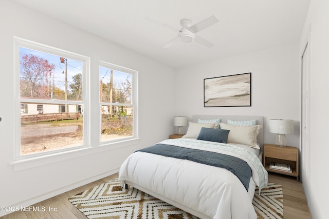 bedroom featuring wood finished floors