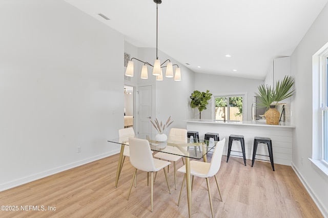 420 Herbert St, Saint Augustine, FL 32084 - dining space with recessed lighting, light wood finished floors, baseboards, and a notable chandelier