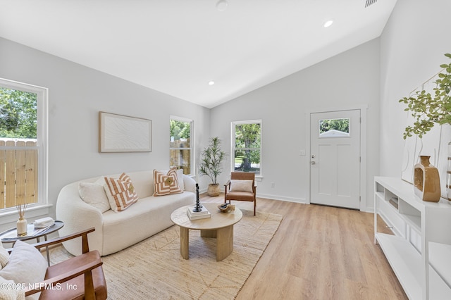 420 Herbert St, Saint Augustine, FL 32084 - living area with light wood finished floors, vaulted ceiling, baseboards, and recessed lighting