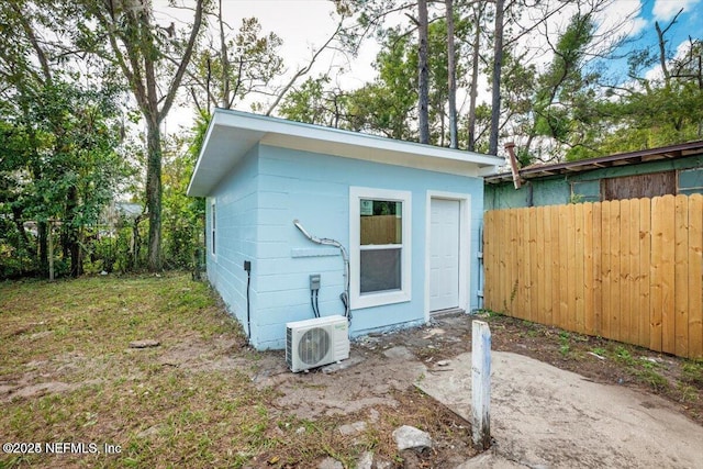 view of outbuilding featuring ac unit