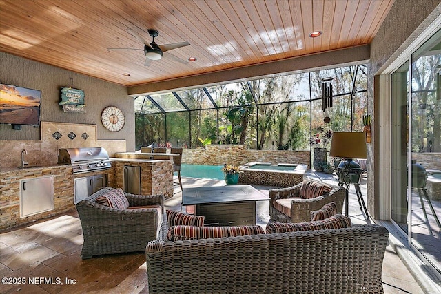 sunroom / solarium with sink, wood ceiling, and ceiling fan