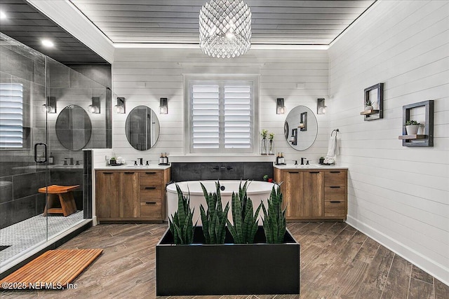 bathroom featuring vanity, separate shower and tub, hardwood / wood-style floors, and wood ceiling