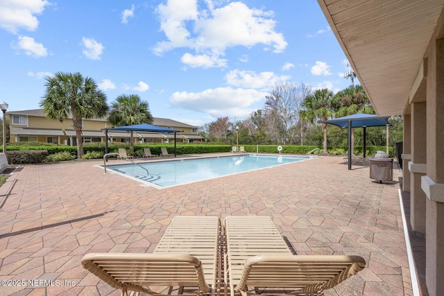 pool with a patio