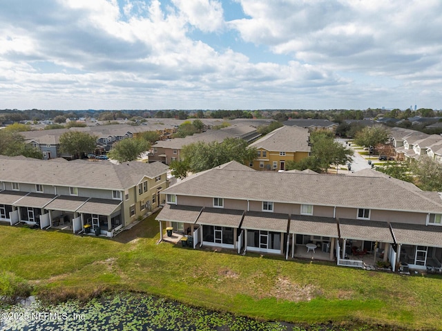 drone / aerial view with a residential view