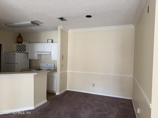 kitchen featuring dark carpet, white appliances, ornamental molding, and white cabinets