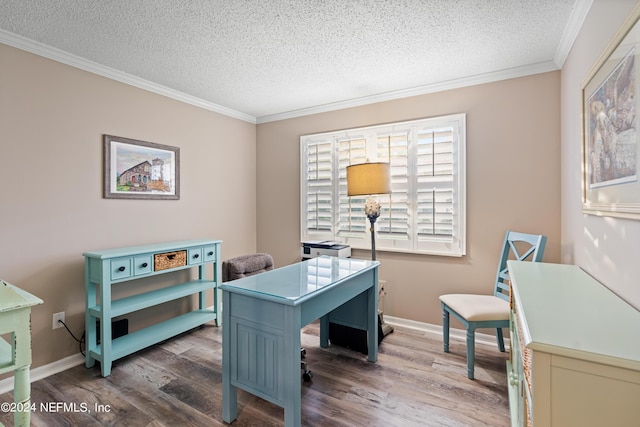 home office featuring ornamental molding, wood-type flooring, and a textured ceiling