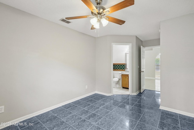 spare room featuring ceiling fan