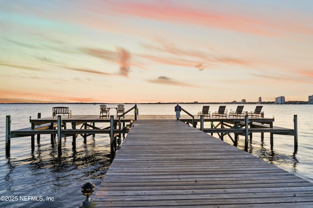 view of dock with a water view