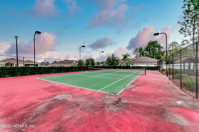 view of sport court with community basketball court and fence