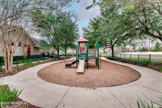 community play area featuring fence