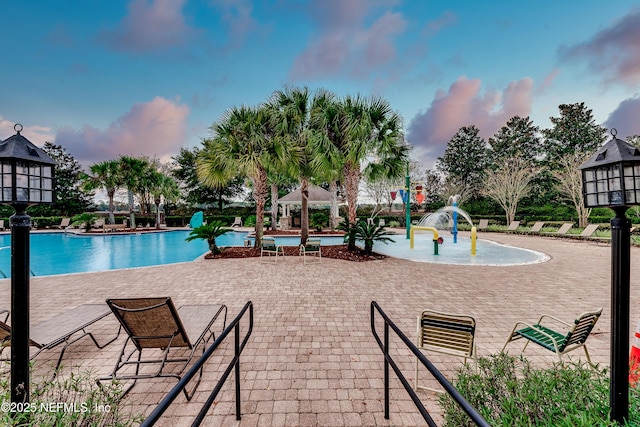 community pool with a gazebo