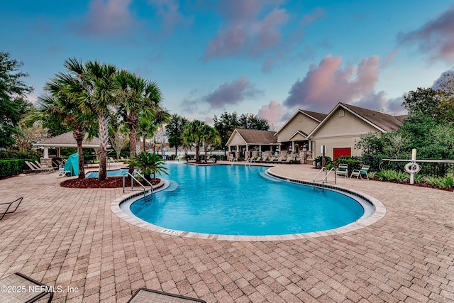 pool featuring a patio and a gazebo