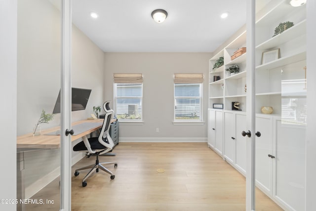 office area featuring baseboards, recessed lighting, and light wood-style floors