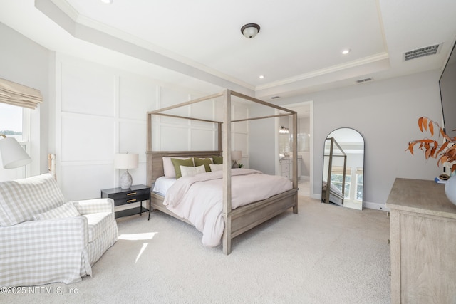 bedroom featuring light carpet, ornamental molding, a raised ceiling, and visible vents