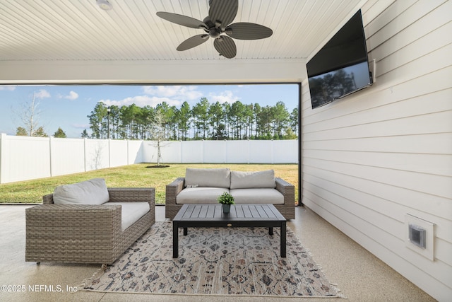 view of patio with ceiling fan, a fenced backyard, and an outdoor hangout area