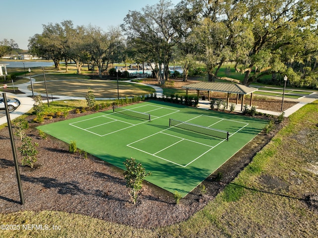 view of tennis court with a gazebo