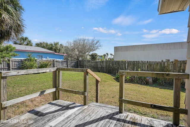 wooden deck with a yard