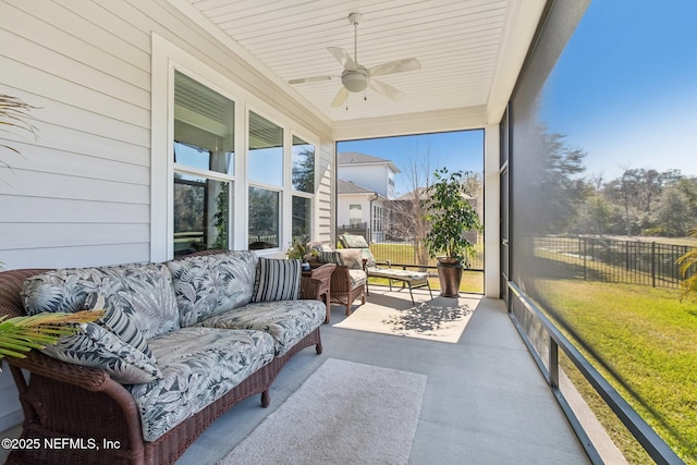 sunroom / solarium with ceiling fan