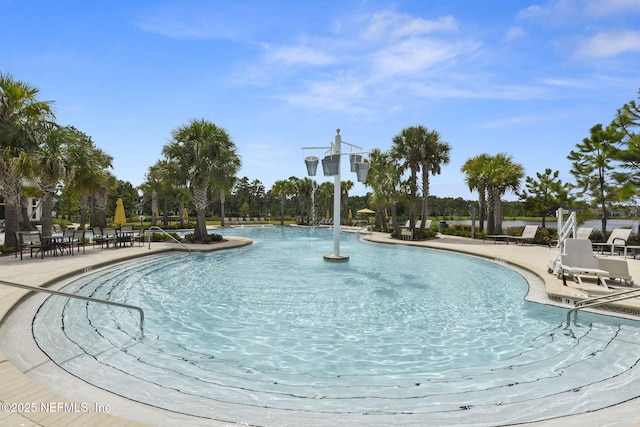 view of pool featuring a patio area