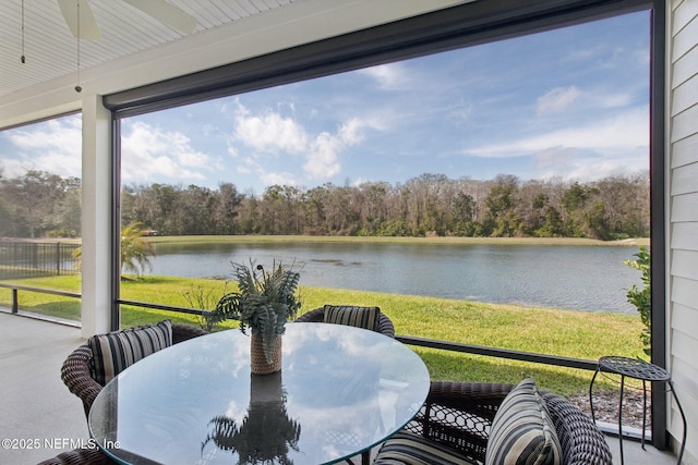 sunroom with a water view