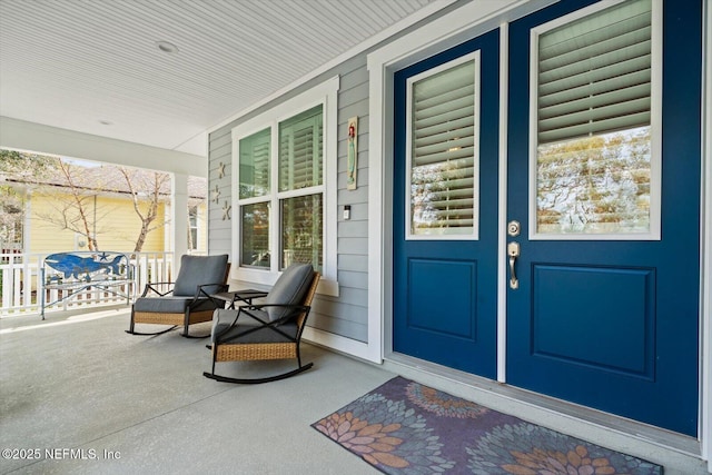 property entrance featuring covered porch