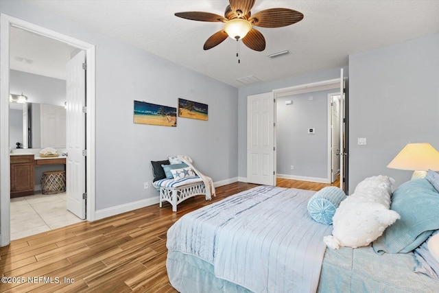 bedroom featuring light hardwood / wood-style floors and ceiling fan