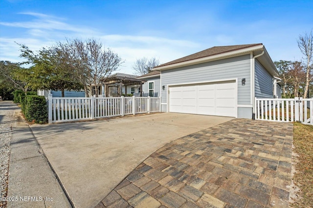 view of front of home with a garage