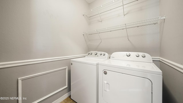 washroom featuring washer and dryer