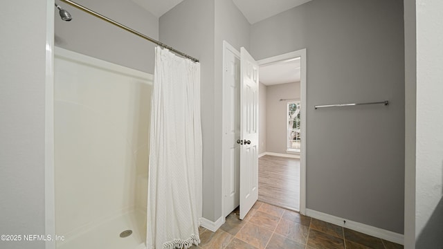 bathroom featuring a shower with curtain