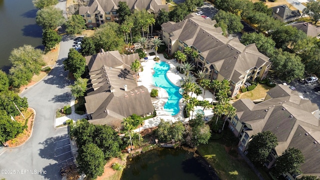 drone / aerial view with a water view