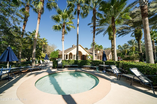 view of swimming pool featuring a patio