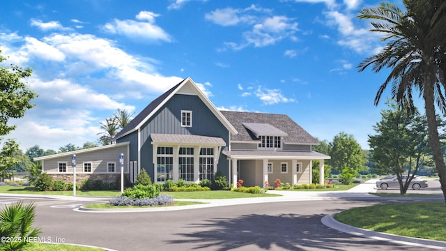 view of front of home featuring a front yard