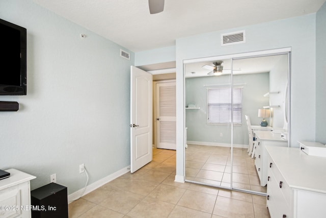 bathroom featuring tile patterned floors and ceiling fan