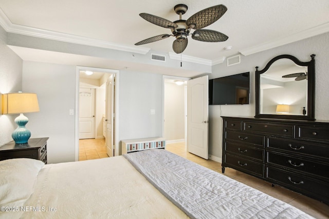 tiled bedroom featuring heating unit, crown molding, ceiling fan, and ensuite bathroom