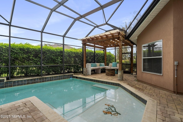 pool with a lanai and a patio area