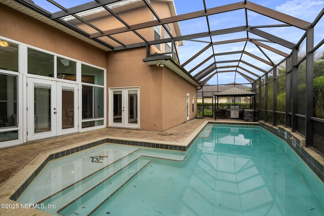 10985 Hickory Trace Ln, Jacksonville, FL 32256 - outdoor pool featuring french doors, area for grilling, a patio, glass enclosure, and a gazebo