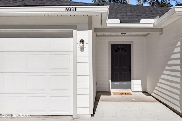 entrance to property with a garage